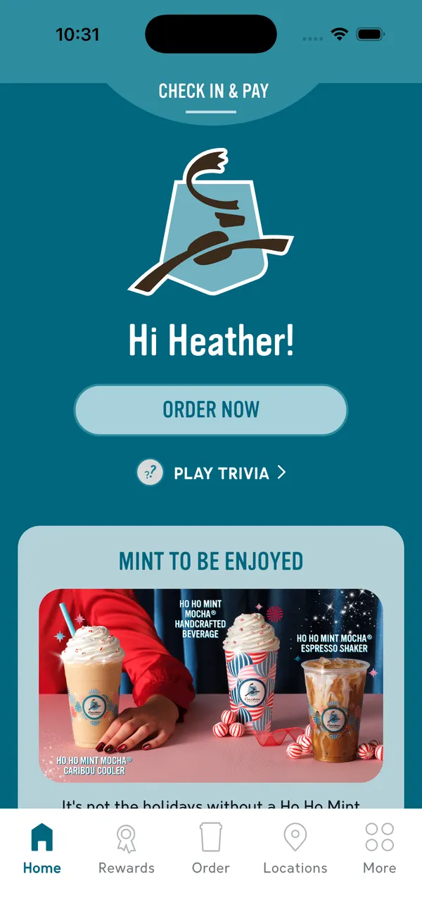 Caribou Coffee app home screen greeting the guest by name, with an Order Now button, a trivia link, and a seasonal promotion.