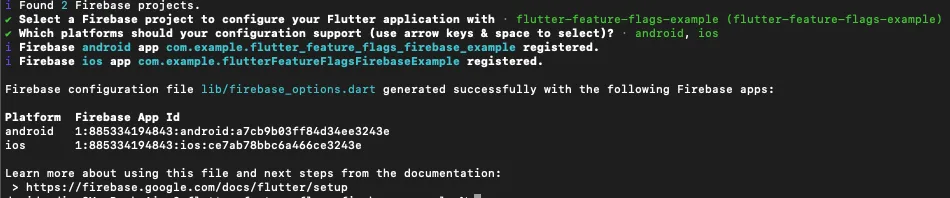 CLI output confirming the Android and iOS apps were registered and firebase_options.dart was generated